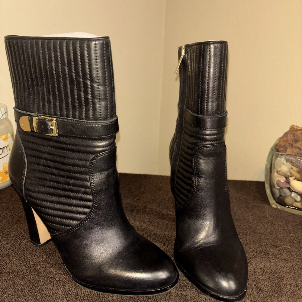 Black boots; 3.25 inch heel; gold hardware; cute classy & sexy; very nice.